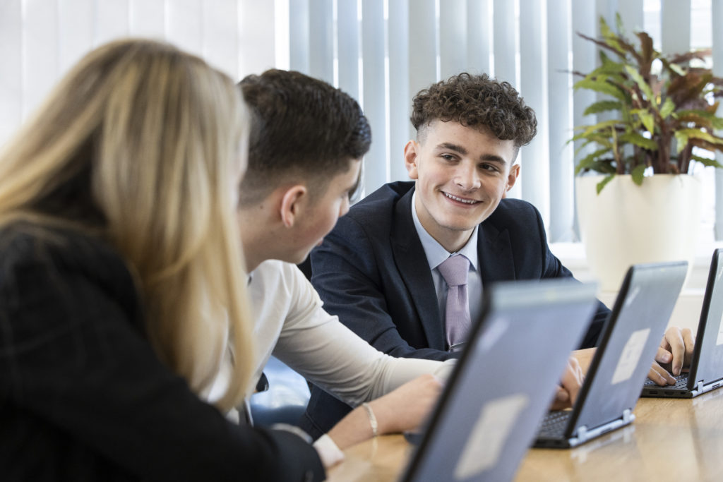 Three Post-16 students talking