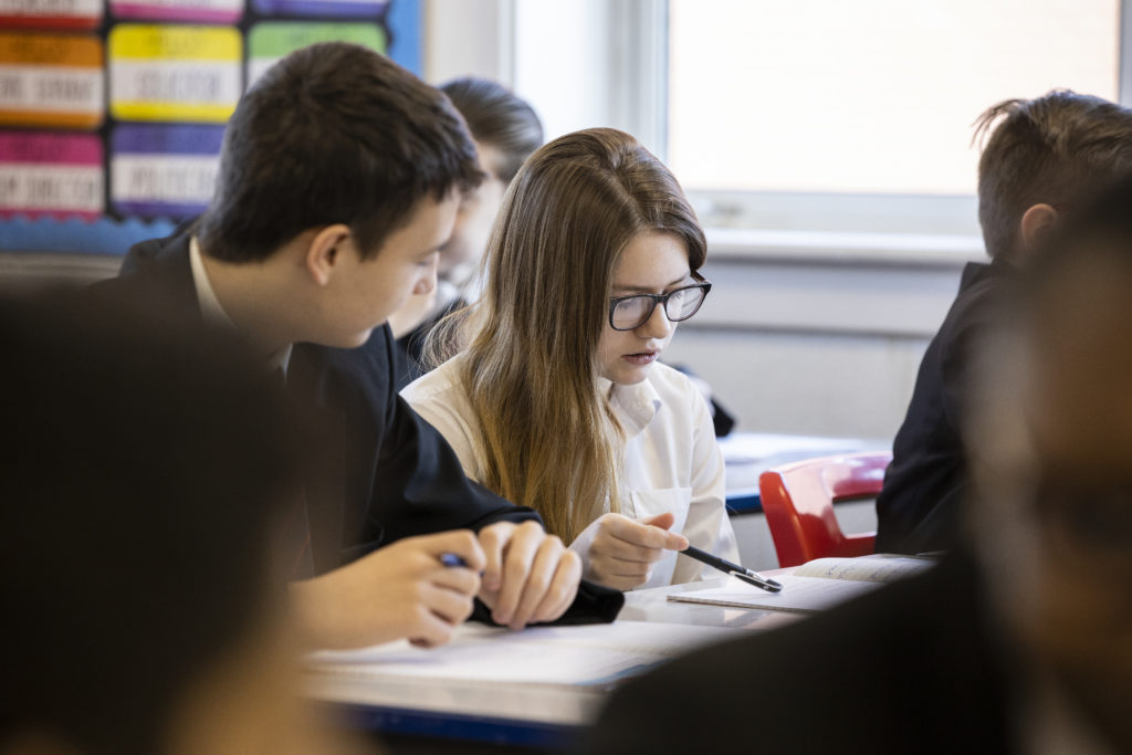 Student looking at their work